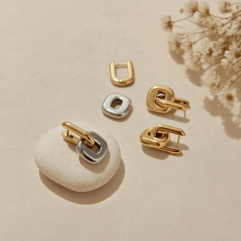 Urban Link Earrings — polished sculptural link earrings in gold / dual-tone, modern and bold design.