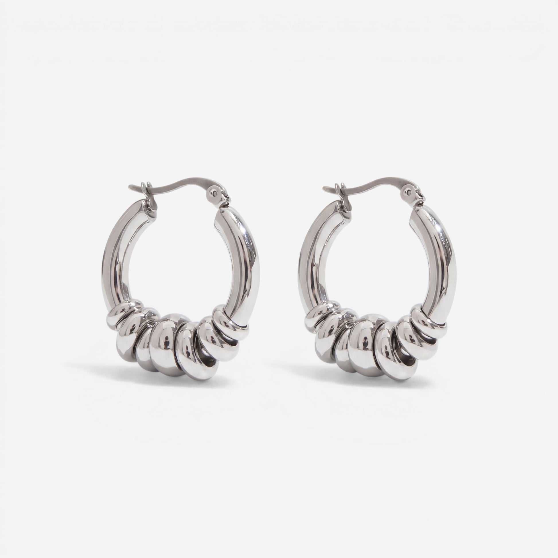 Silver multi-band hoop earrings high polish waterproof stainless steel.