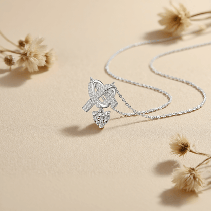 Lovebound Heart Moissanite Necklace — heart shaped moissanite pendant in sterling silver on delicate chain, romantic and luminous.