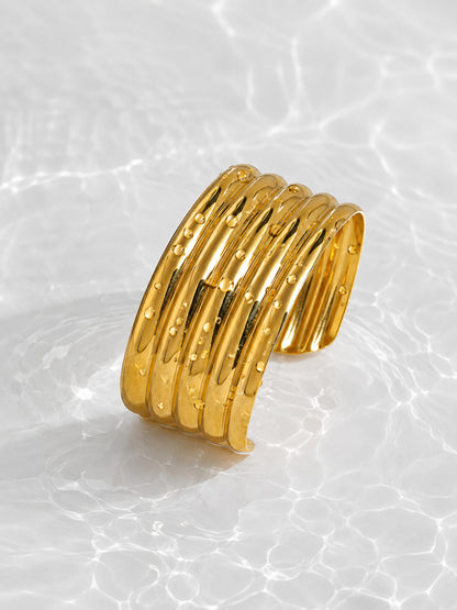 Aurelia Ribbed Cuff showing the wide ribbed profile and open cuff shape