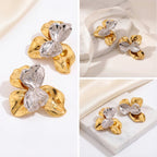 Aesthetic product photography collage of organic shape gold and crystal statement studs.