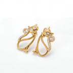 Pair of gold outline cat stud earrings with pave crystal tail waterproof stainless steel.