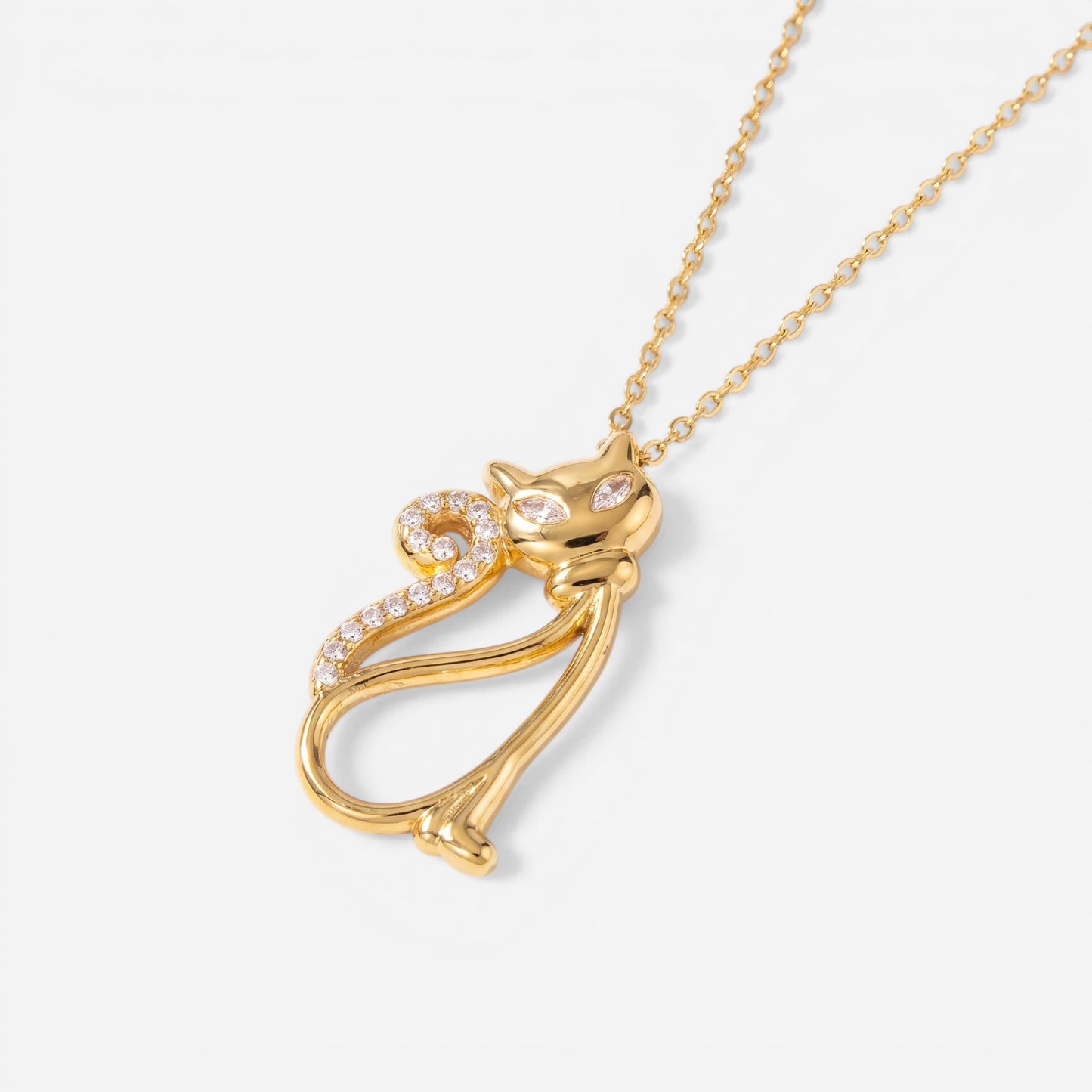Gold cat silhouette pendant necklace with pave crystal tail waterproof stainless steel.