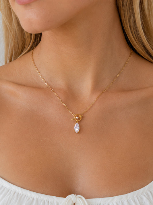 Model wearing the Celeste Marquise Toggle Necklace with clear zircon pendant