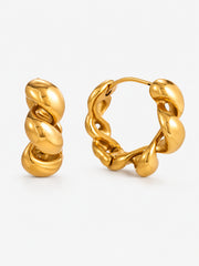 Side view of Chunky Twisted Gold Hoop Earrings showing the sculpted twist profile