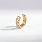 18k gold plated stainless steel ear cuff, emerald cut cubic zirconia clip on earring, waterproof non-tarnish jewelry isolated on white.