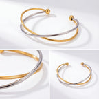 Two-tone mixed metal bangle gold and silver stainless steel jewelry details.