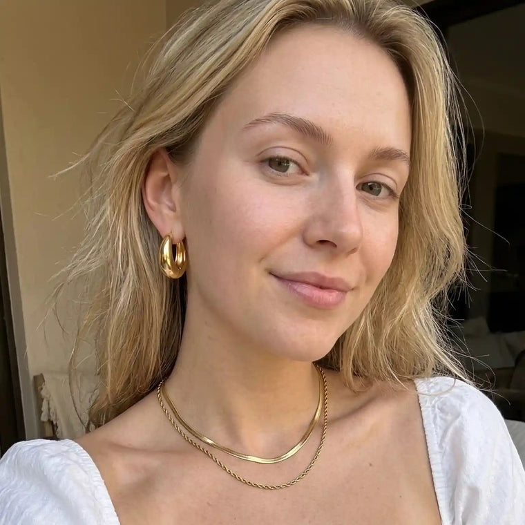 Customer wearing LumiNova jewelry