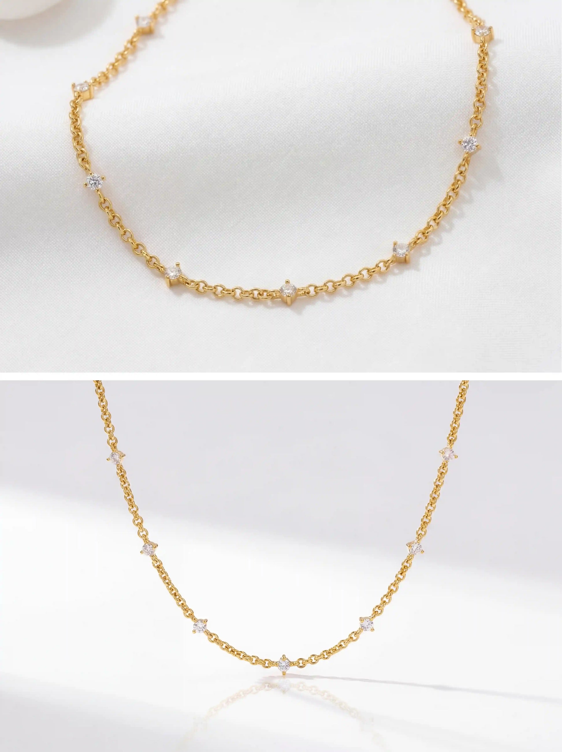 Aesthetic product photography details of dainty gold Elara station necklace on white stone display.