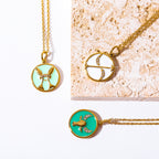 Green Taurus and white Sagittarius zodiac coin pendants vintage style gold jewelry.