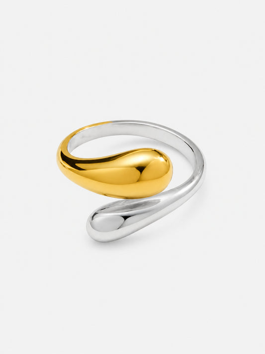 Two-tone Gemini Sculptural Teardrop Ring with opposing gold and silver teardrop ends