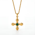 Gold byzantine cross necklace with green emerald stone center stainless steel.