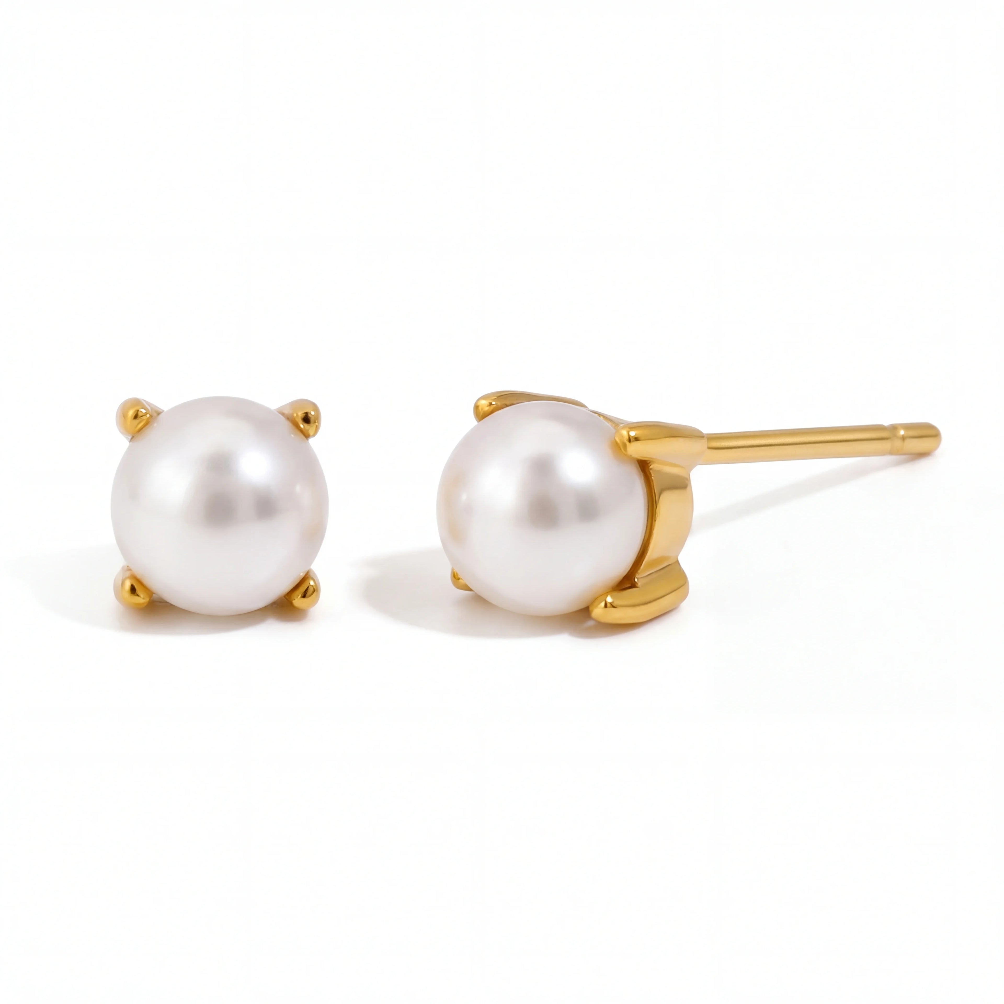 18k gold plated stainless steel micro pearl studs, 4-prong setting tiny earrings, waterproof anti-tarnish jewelry isolated on white.