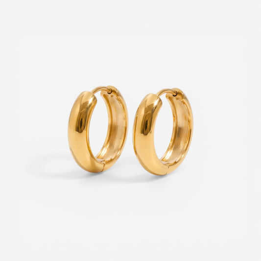 Pair of gold chunky dome hoop earrings waterproof stainless steel high polish.