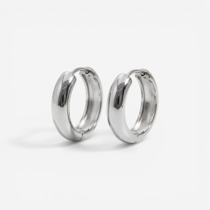 Silver chunky dome huggie earrings stainless steel minimalist design.