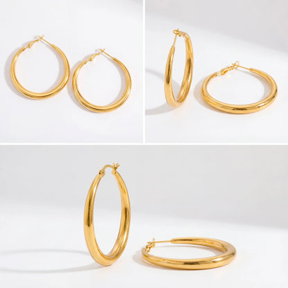 Detail shot of medium gold hoops everyday essential jewelry details.