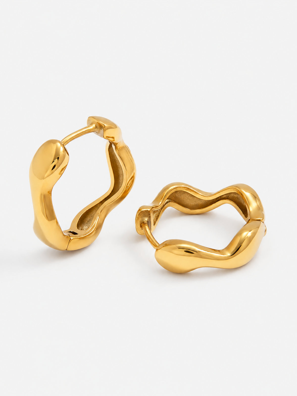 Nola Organic Wave Hoops in Gold with a sculptural irregular hoop silhouette