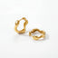 18k gold plated stainless steel organic hoops, abstract wavy shape earrings, water-resistant sculptural jewelry isolated on white background.
