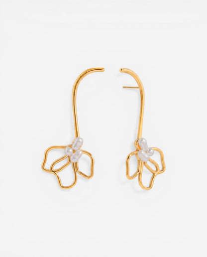 Pair of gold curve drop earrings with wireframe floral petal design and pearl cluster center.