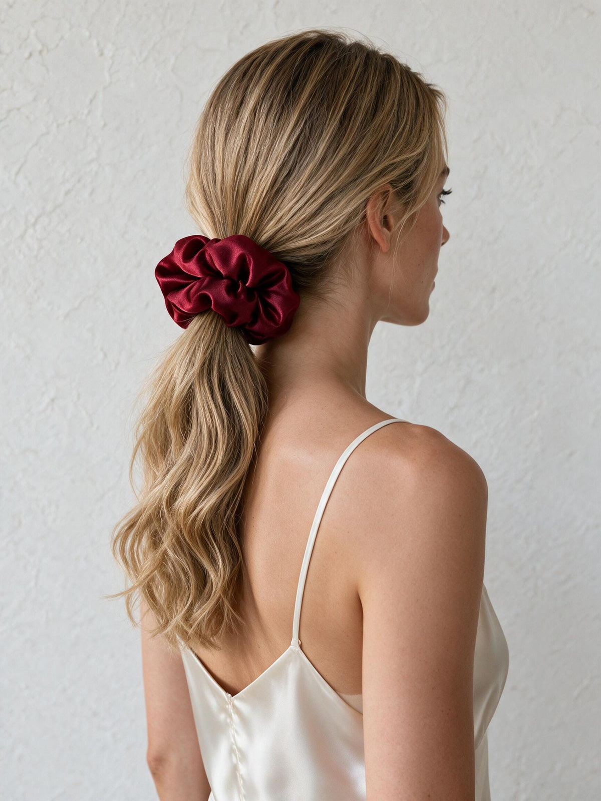 Form Pillow Scrunchie worn in a ponytail
