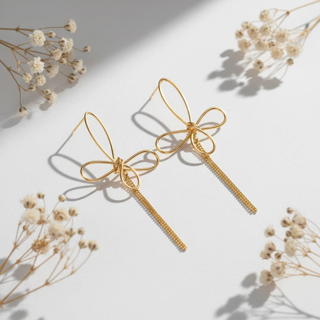 Let your soul take flight with The Psyche Earrings. A minimalist wire butterfly with a delicate tassel. The perfect symbol of transformation. Hypoallergenic.
