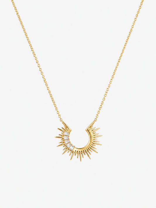 Radiant Sunburst Arc Necklace with open gold sunray pendant and baguette-cut zircon accents