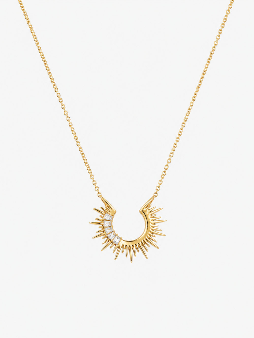 Radiant Sunburst Arc Necklace with open gold sunray pendant and baguette-cut zircon accents