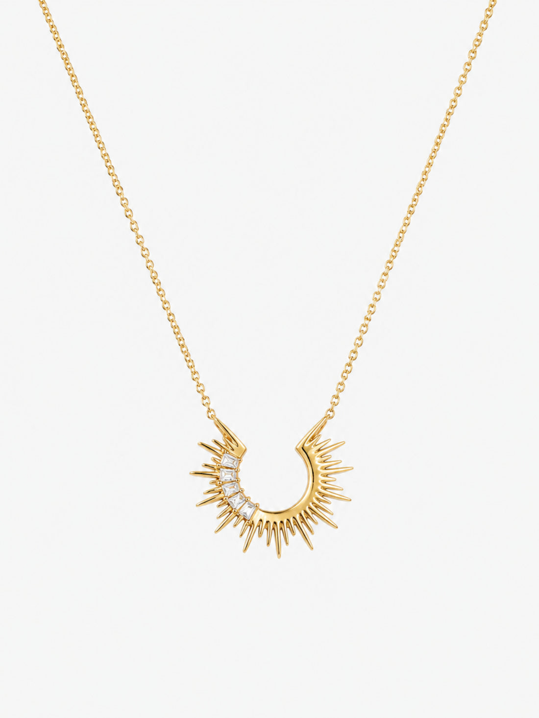 Radiant Sunburst Arc Necklace with open gold sunray pendant and baguette-cut zircon accents