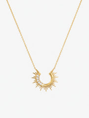Radiant Sunburst Arc Necklace with open gold sunray pendant and baguette-cut zircon accents