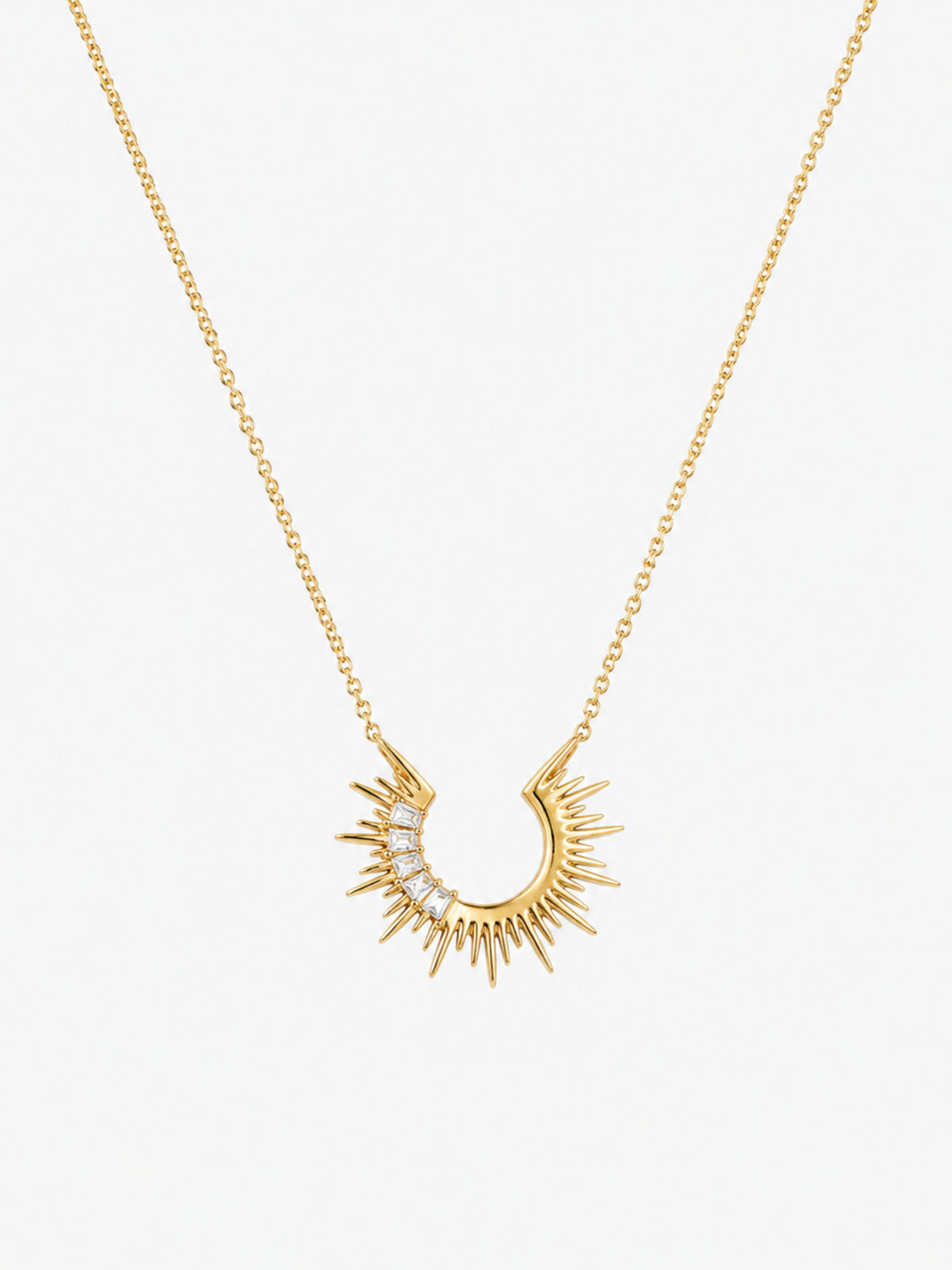 Radiant Sunburst Arc Necklace with open gold sunray pendant and baguette-cut zircon accents