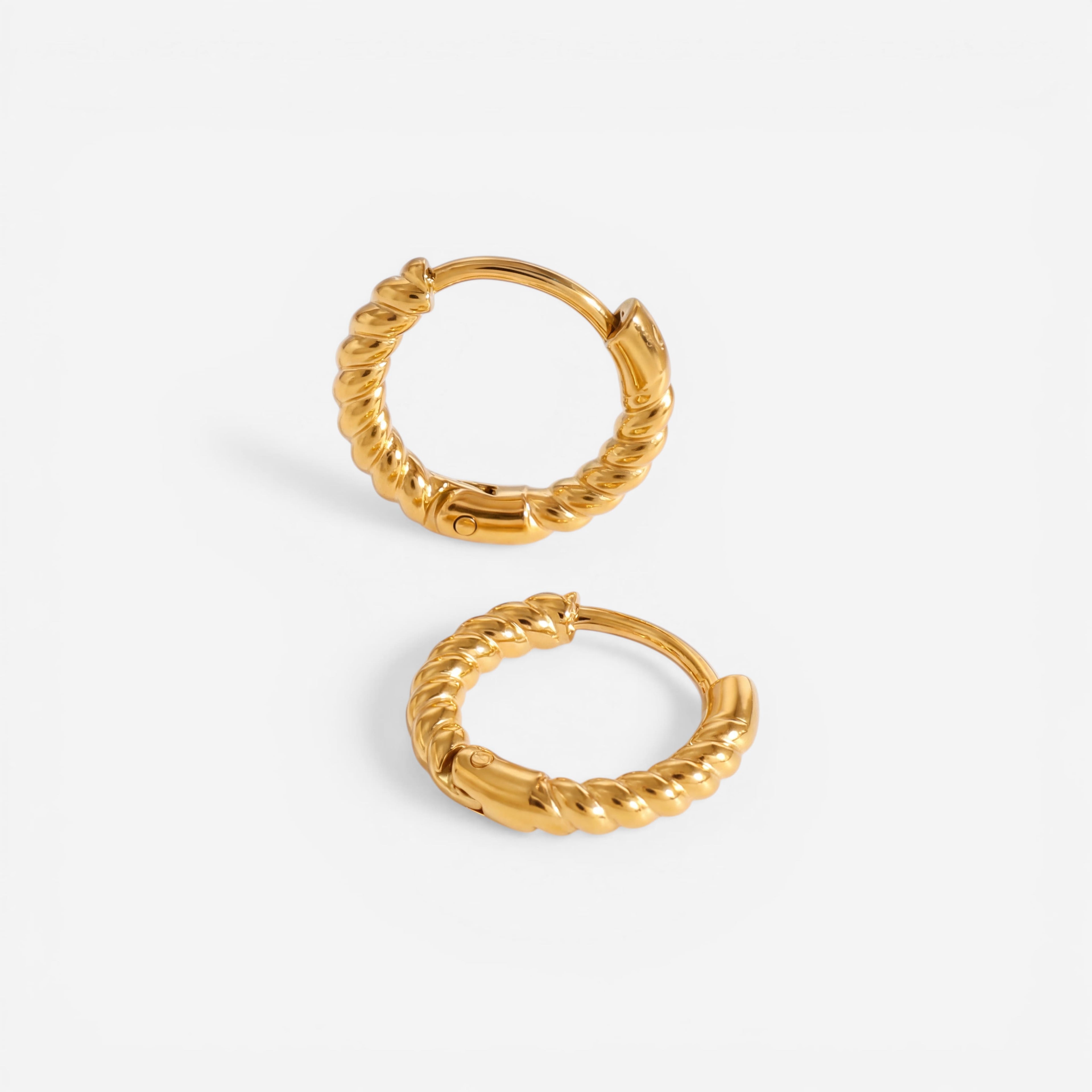 18k gold plated stainless steel twisted rope huggies, anti-tarnish small hoop earrings, textured minimalist jewelry isolated on white.