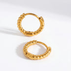 18k gold plated stainless steel twisted rope huggies, anti-tarnish small hoop earrings, textured minimalist jewelry isolated on white.