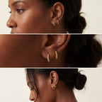 Small gold and silver twisted huggies on dark skin tone, dainty rope hoops for second piercing, lightweight comfortable office jewelry.