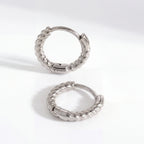 Silver stainless steel twisted huggie earrings, cool tone rope texture hoops, waterproof cartilage earrings for sensitive ears.