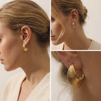 Woman wearing gold hammered hoop earrings, quiet luxury jewelry style, casual everyday gold accessories that are waterproof and sweat-proof.