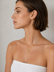 Signature Initial Zircon Necklace styled as a personal everyday pendant