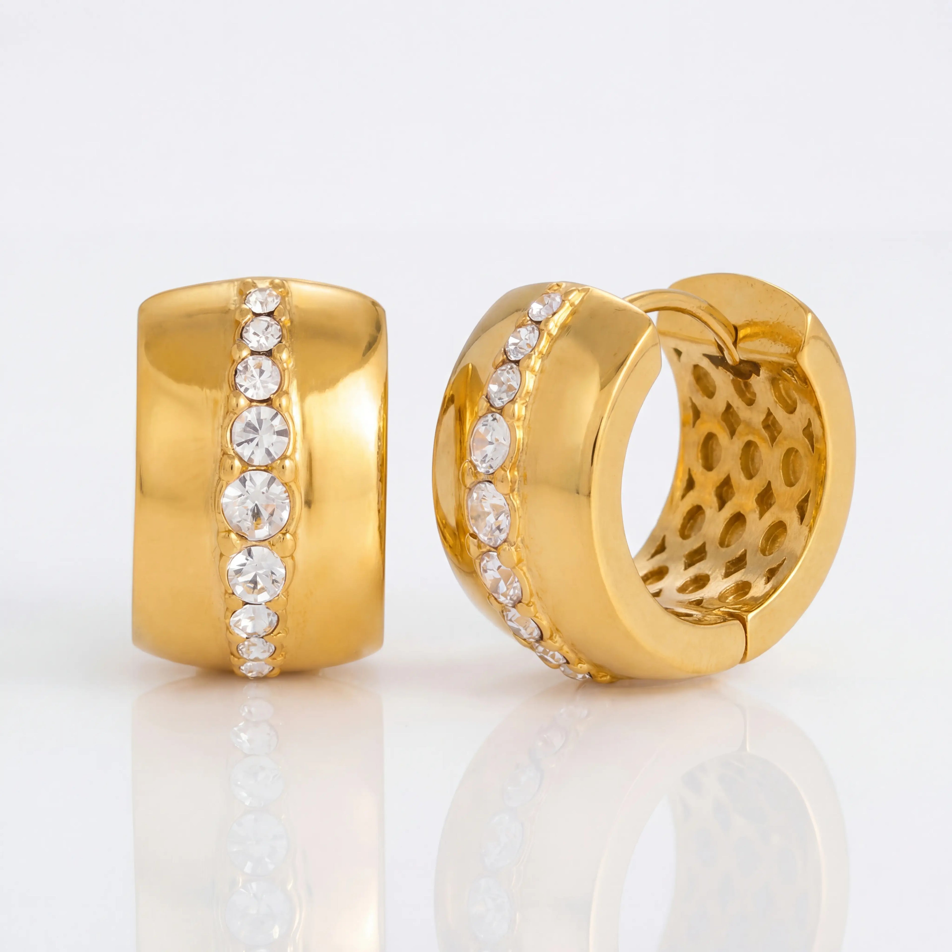 Pair of wide gold hoop earrings with central cubic zirconia line waterproof stainless steel.