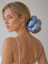 Model wearing Form Silk Pillow Scrunchie in Powder Blue