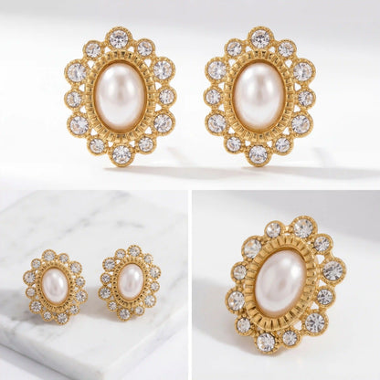 Aesthetic product photography details of antique style pearl and crystal earrings on white stone.