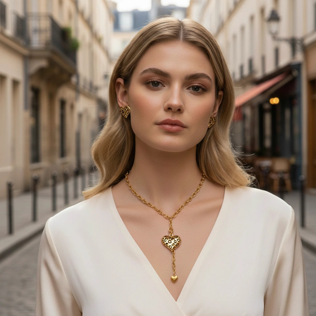 The Artemis Lariat perfectly complementing a white v-neck top, demonstrating how the Y-necklace design enhances the silhouette.