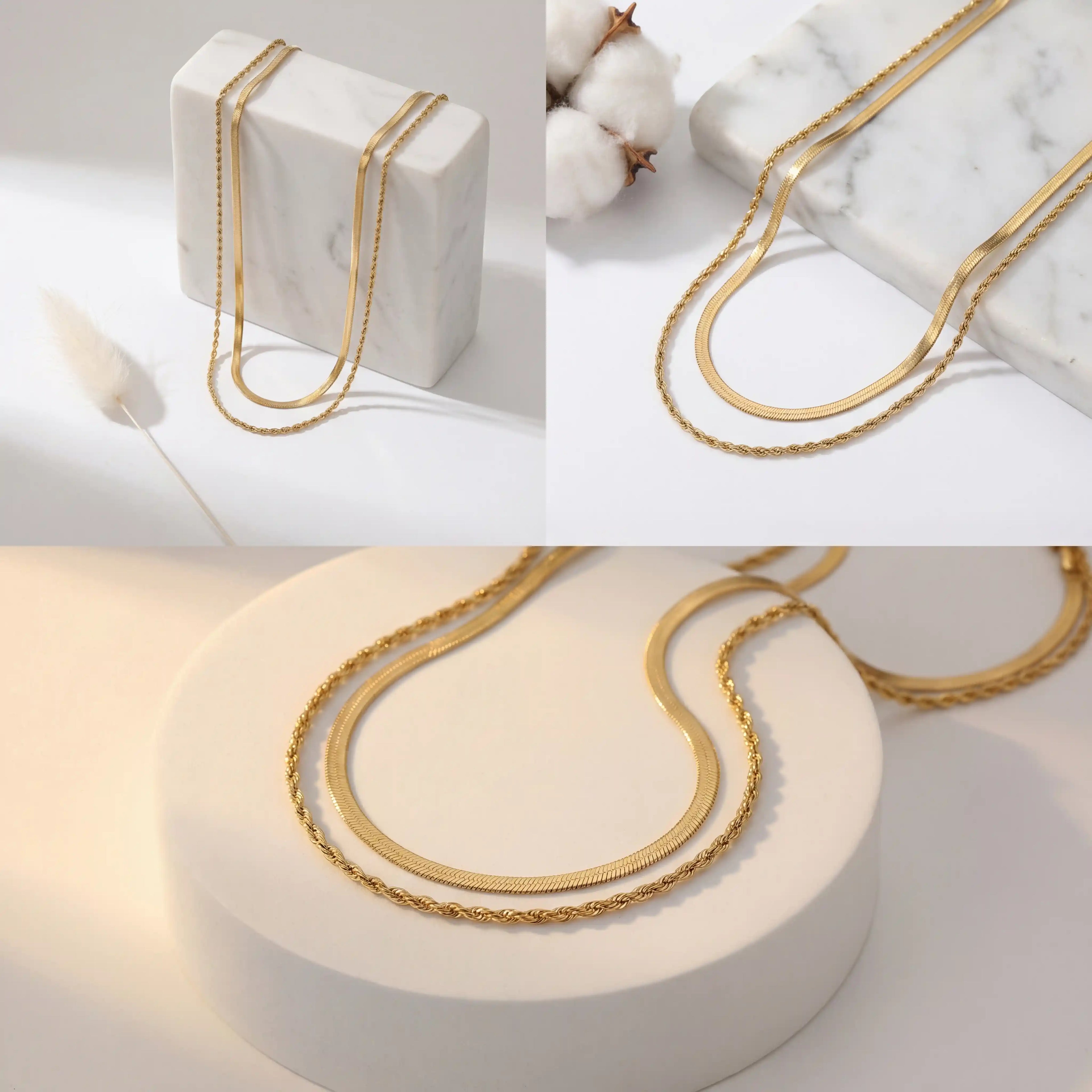 Aesthetic product photography of double strand gold necklace on white stone display.
