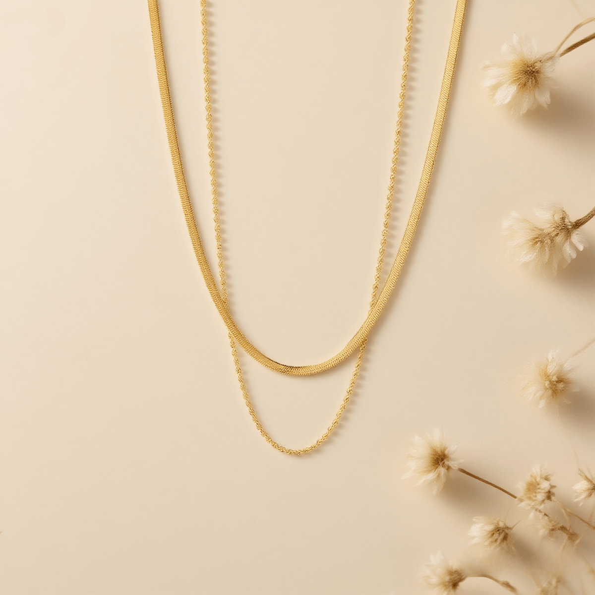 Classic Layered Chain Necklace — two gold chains: sleek herringbone and rope style, 18K gold plated.