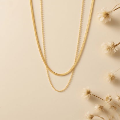 Classic Layered Chain Necklace — two gold chains: sleek herringbone and rope style, 18K gold plated.