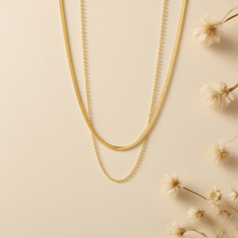 Classic Layered Chain Necklace — two gold chains: sleek herringbone and rope style, 18K gold plated.