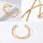 Product details collage of gold minimalist wire cuff bracelet adjustable fit.