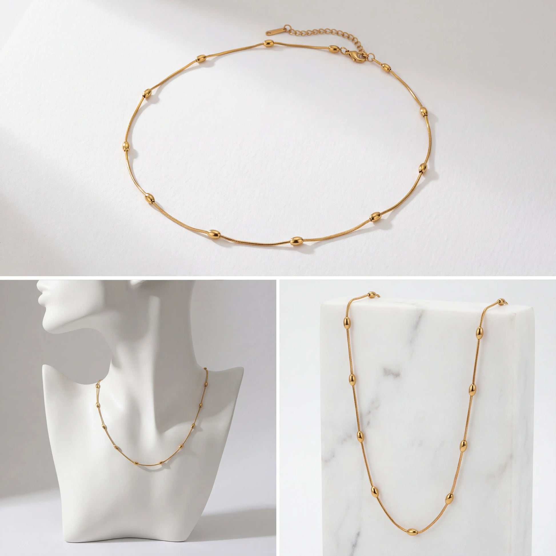 Aesthetic product photography of dainty gold beaded necklace on jewelry bust.