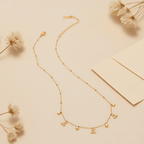 Golden Dew Necklace — delicate gold dew-drop pendant on extender chain, romantic and luminous accessory.
