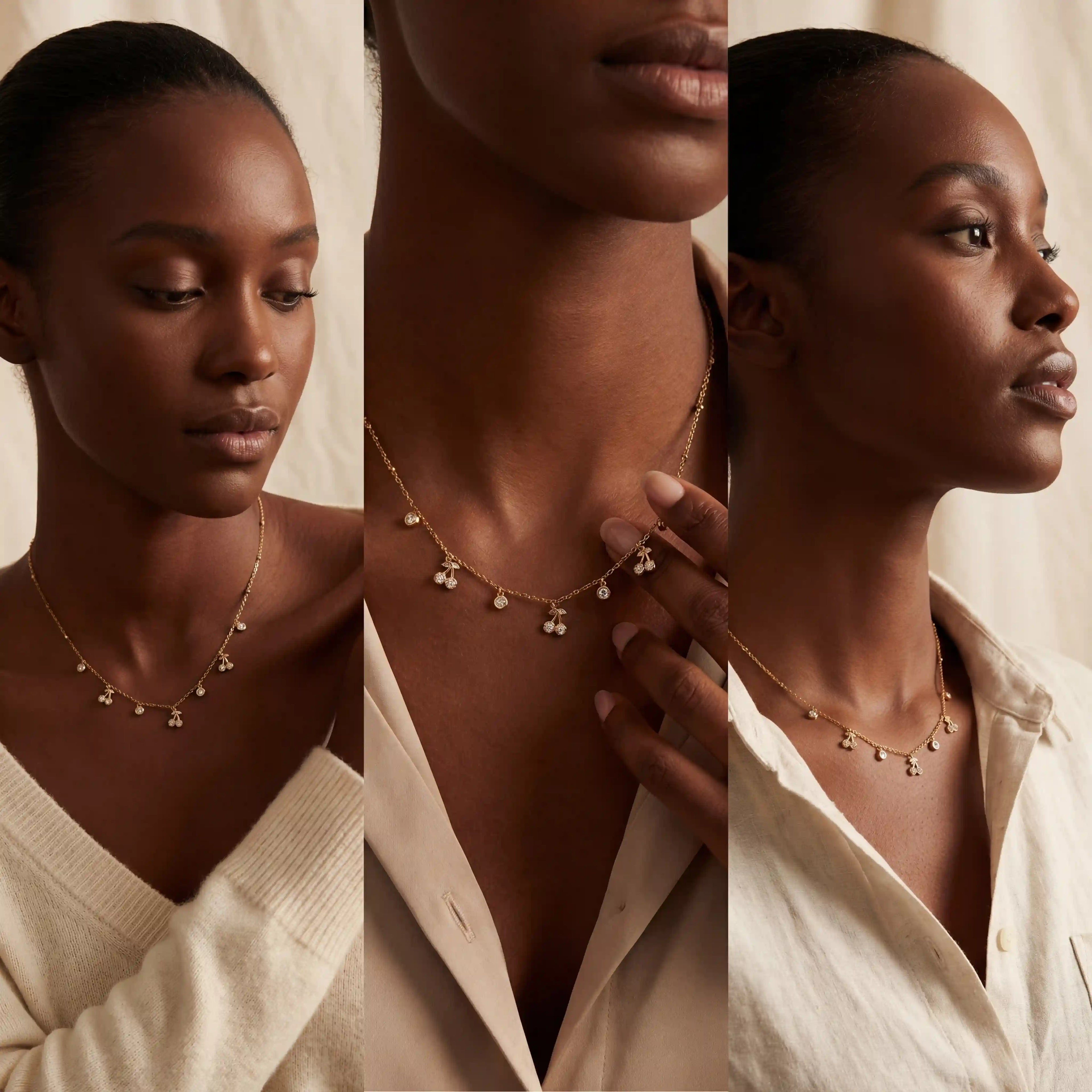 Model with dark skin wearing gold crystal station necklace elegant evening jewelry.