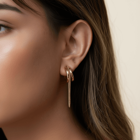 Model wearing the two-tone Luxe Layered Chain Hoops, paired with a black silk blouse to showcase the statement design.
