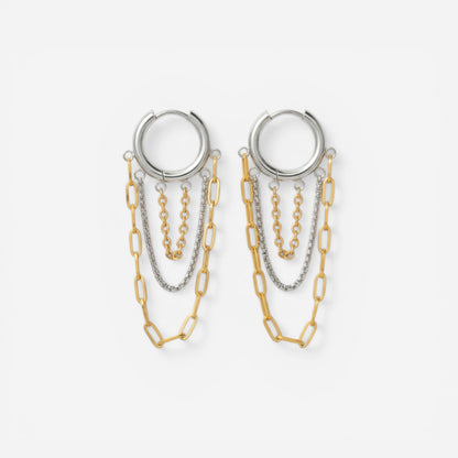 Mixed metal two-tone hoop earrings with silver and gold dangling chains.
